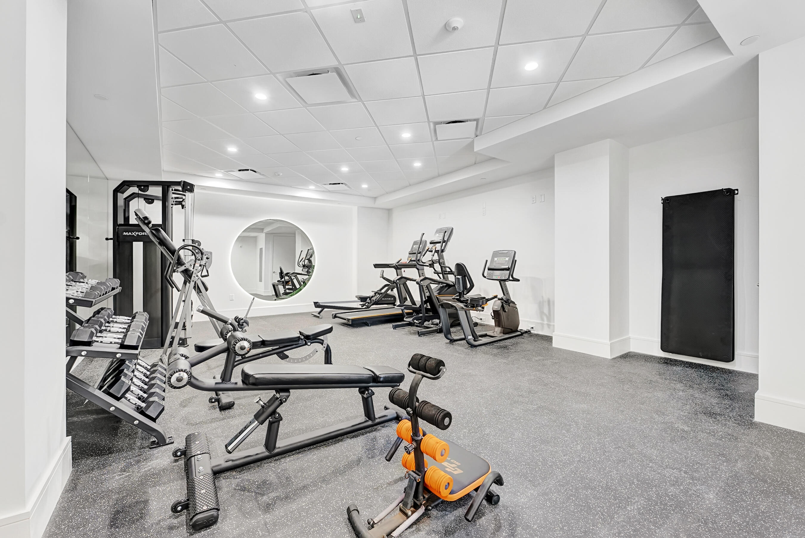1 South Coastal Way, Unit 205 Jupiter, FL 33477 - Photo 37 of 67 a view of a room with gym equipment