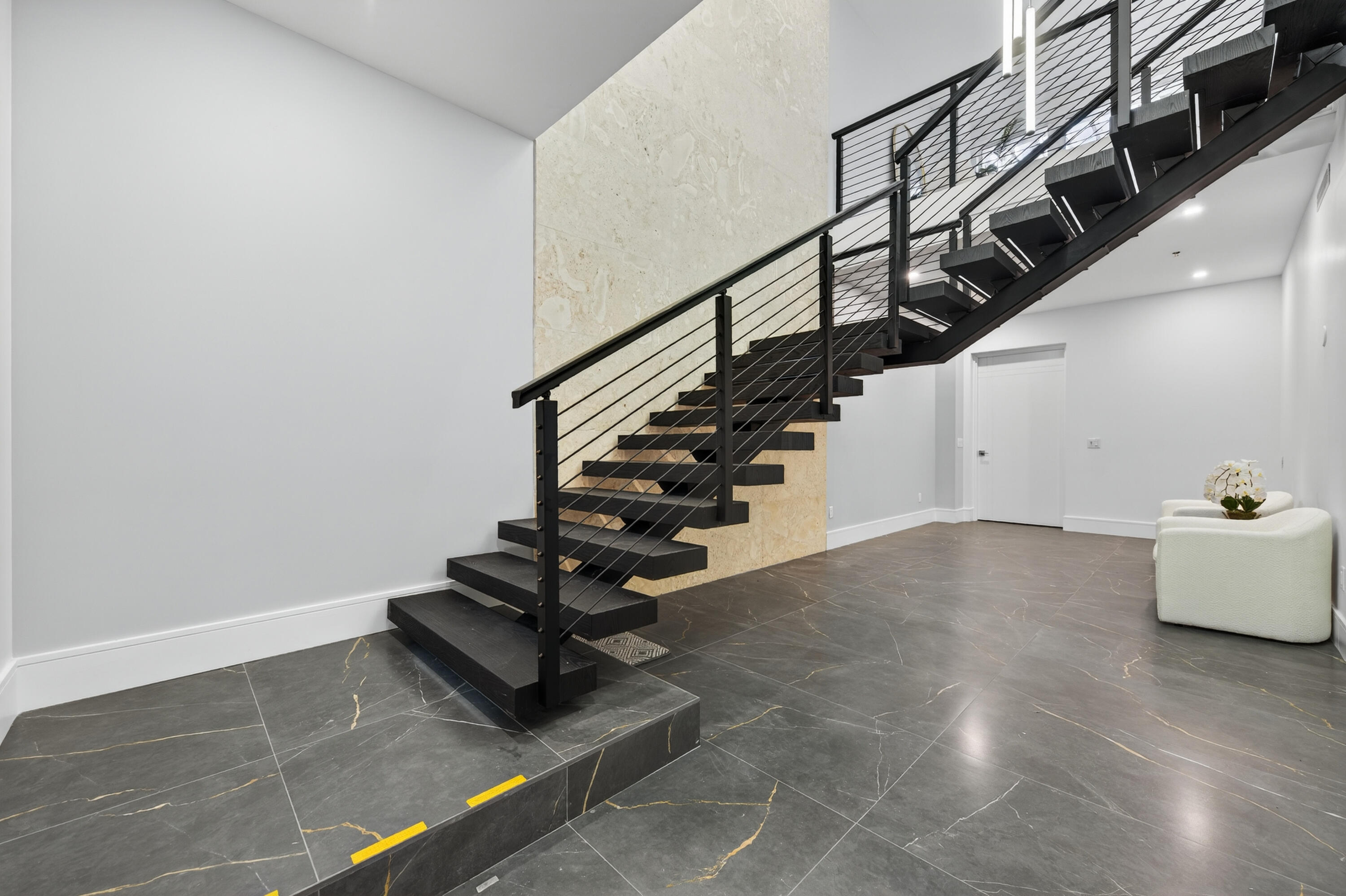 1 South Coastal Way, Unit 205 Jupiter, FL 33477 - Photo 7 of 67 a view of entryway with wooden floor