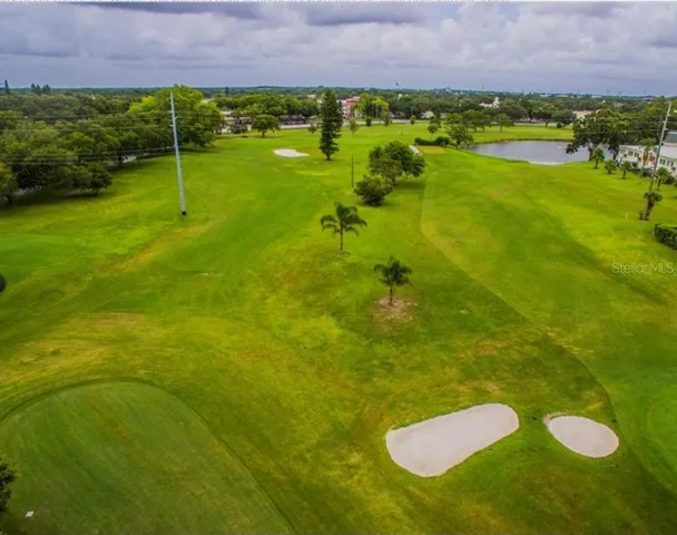 a view of a garden with an ocean