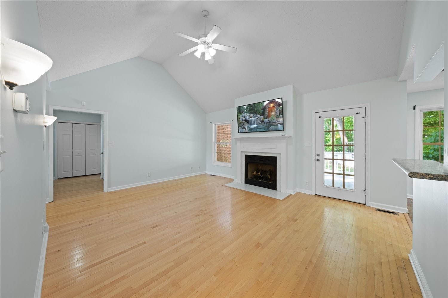 113 Brookview Court Springfield, TN 37172 - Photo 17 of 46 a view of empty room with fireplace and wooden floor