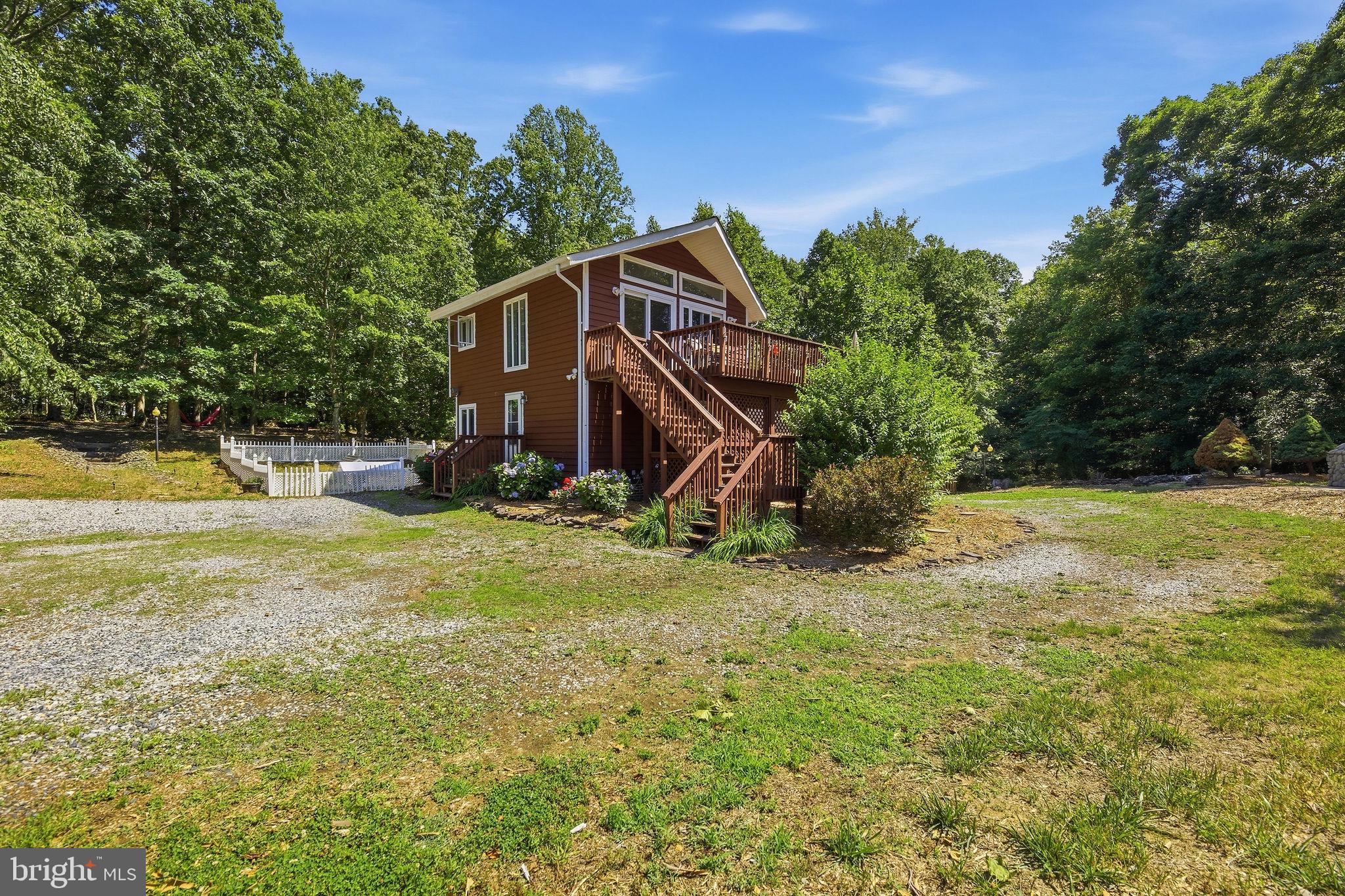 4150 Williams Wharf Road St. Leonard, MD 20685 - Photo 52 of 70 Charming retreat amidst lush greenery.