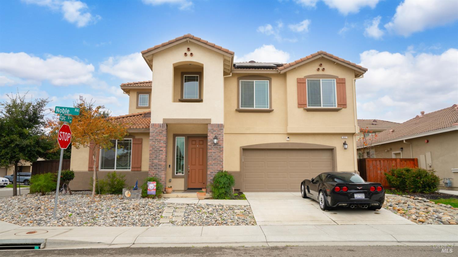 a car parked in front of a house