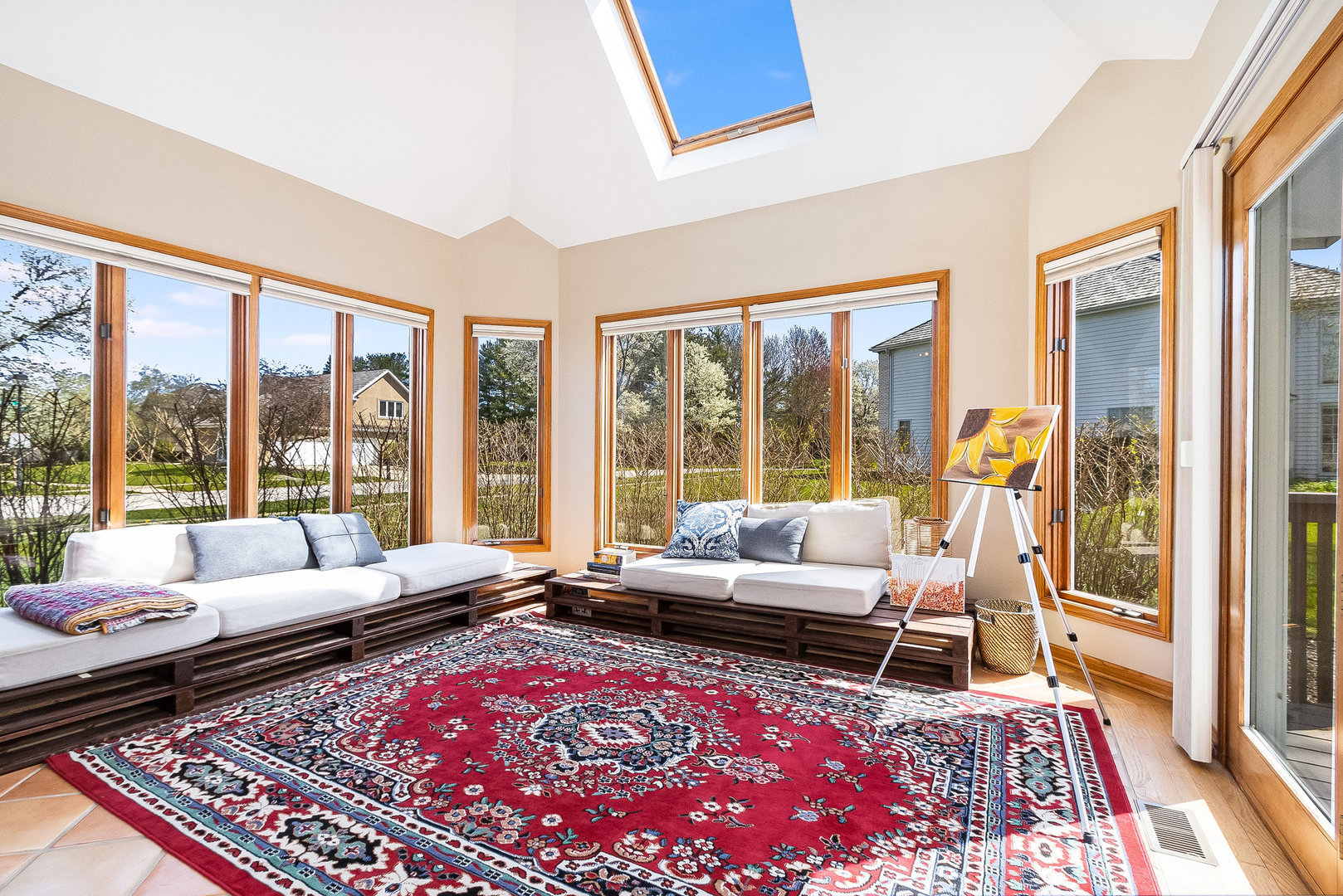 2204 Arrowhead Drive Naperville, IL 60564 - Photo 18 of 40 a living room with furniture floor to ceiling windows and a rug