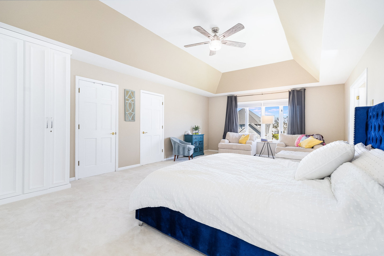 2204 Arrowhead Drive Naperville, IL 60564 - Photo 22 of 40 a bedroom with a bed chandelier and a window