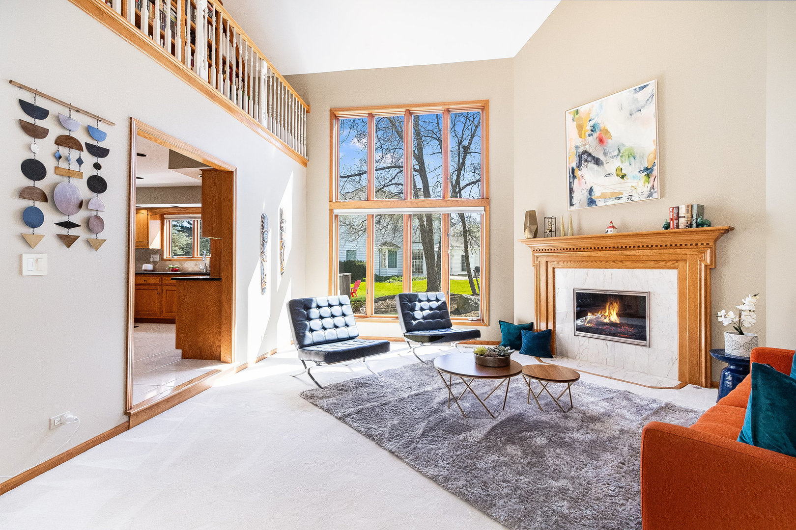 2204 Arrowhead Drive Naperville, IL 60564 - Photo 5 of 40 a living room with furniture and a fireplace