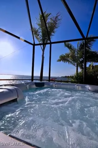 a bathroom with a granite countertop sink a mirror and vanity