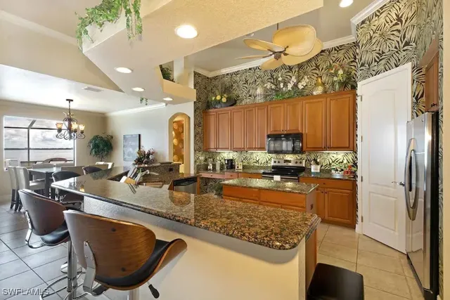 a dining room with furniture window and outside view