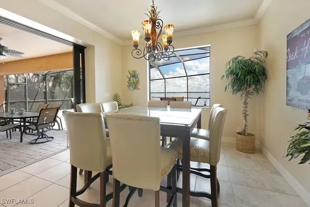 a bed sitting in a spacious bedroom next to a window