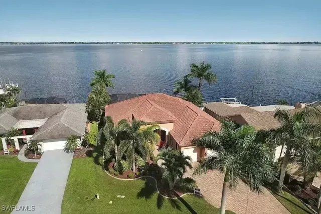 a view of a lake with a yard