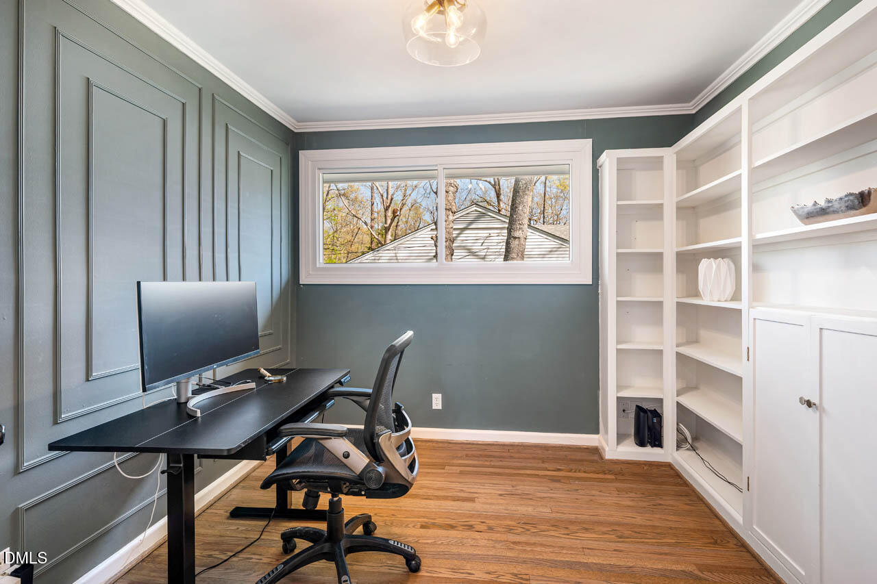 231 Flemington Road Chapel Hill, NC 27517 - Photo 17 of 48 a view of a workspace with furniture and a window