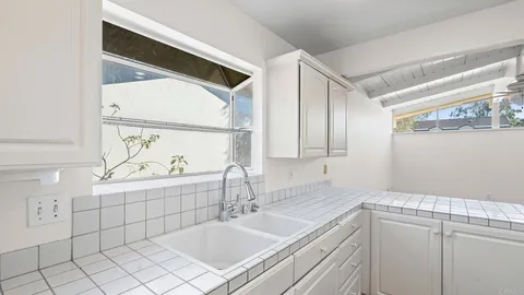 a bathroom with a sink and a bathtub