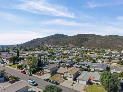 an aerial view of a city with lots of residential buildings