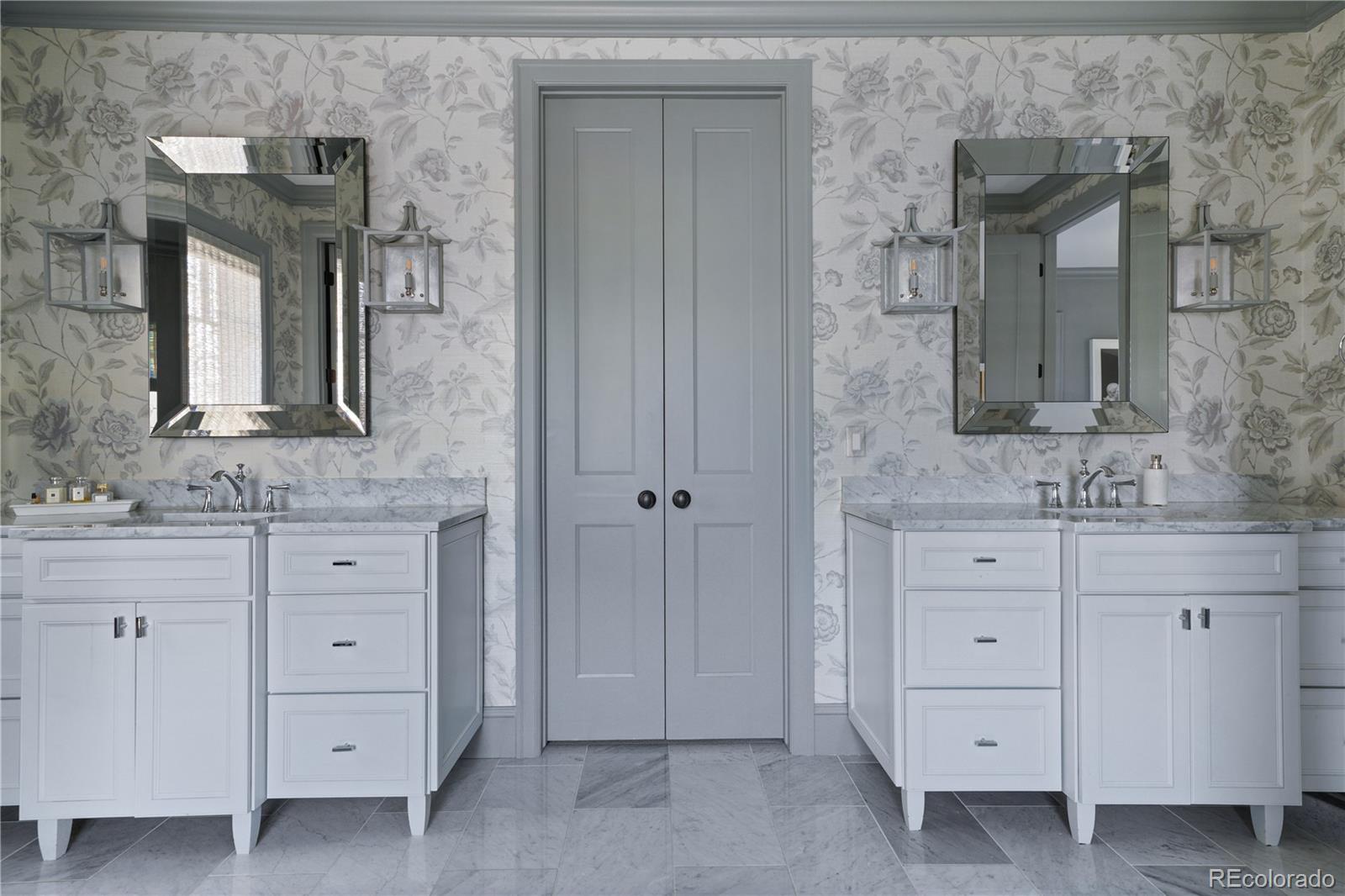 470 South York Street Denver, CO 80209 - Photo 22 of 36 a bathroom with a double vanity sink and mirror