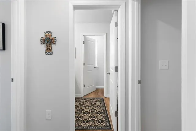 a bathroom with a shower and a carpet