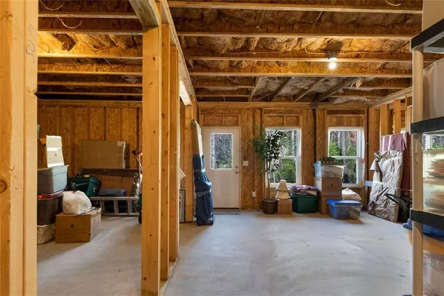 a view of living room with furniture and a window