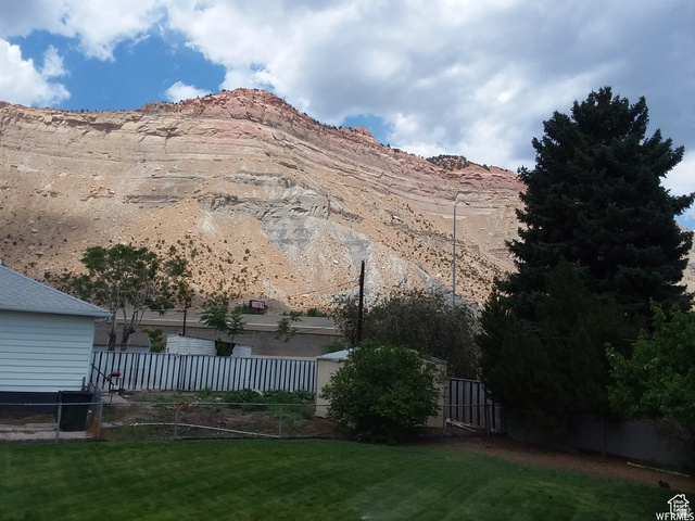 73 Garden Street Helper, UT 84526 - Photo 8 of 36 View of yard featuring a mountain view