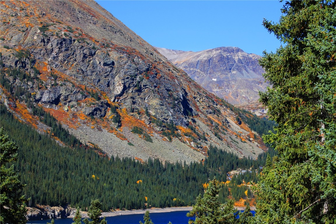 157 Goldfinch Place Alma, CO 80420 - Photo 13 of 34 a view of a large building with a mountain in the background