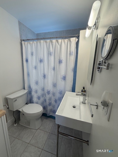 1 Cannon Square Stonington, CT 06378 - Photo 19 of 21 a bathroom with a sink toilet and shower