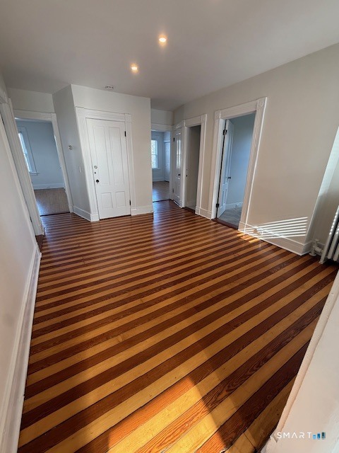 1 Cannon Square Stonington, CT 06378 - Photo 3 of 21 a view of a room with wooden floor and stairs