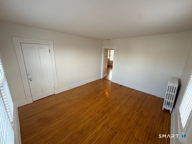1 Cannon Square Stonington, CT 06378 - Photo 5 of 21 a view of empty room with wooden floor