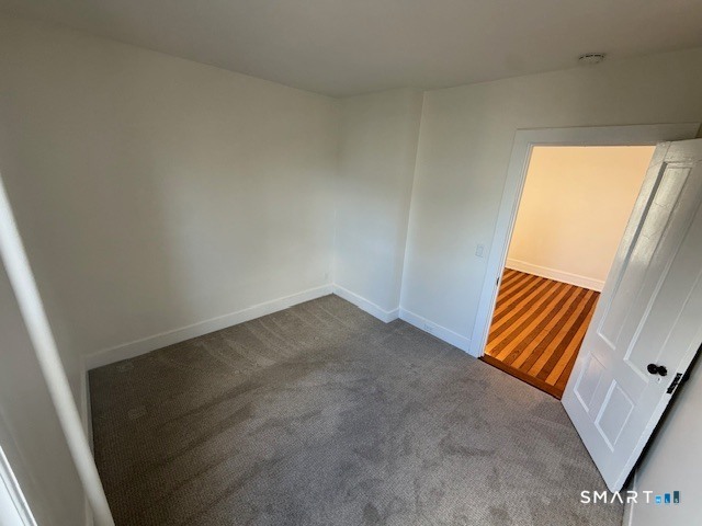 1 Cannon Square Stonington, CT 06378 - Photo 6 of 15 a view of an empty room and a window