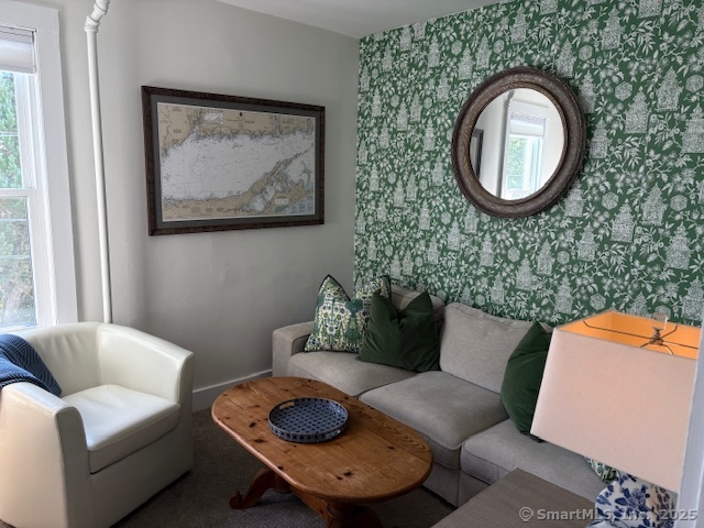 1 Cannon Square Stonington, CT 06378 - Photo 9 of 21 a living room with furniture and a mirror