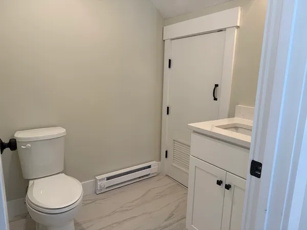 a bathroom with a sink and mirror