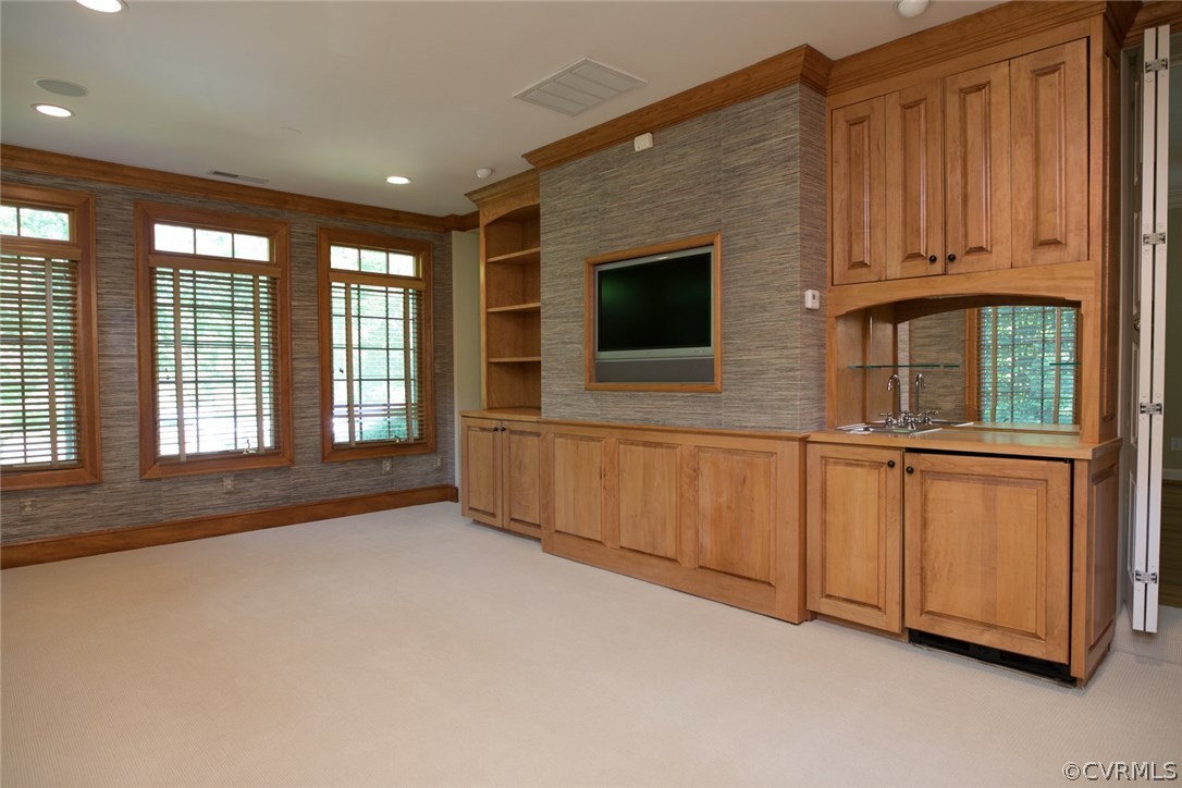 4610 Sulgrave Road Richmond, VA 23221 - Photo 12 of 32 The Den features a wall of built-ins and mirrored