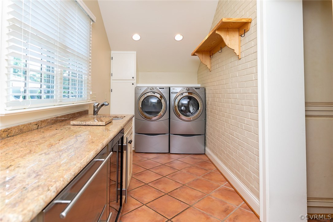 4610 Sulgrave Road Richmond, VA 23221 - Photo 18 of 32 The Utility / Laundry Room has cabinetry with gran