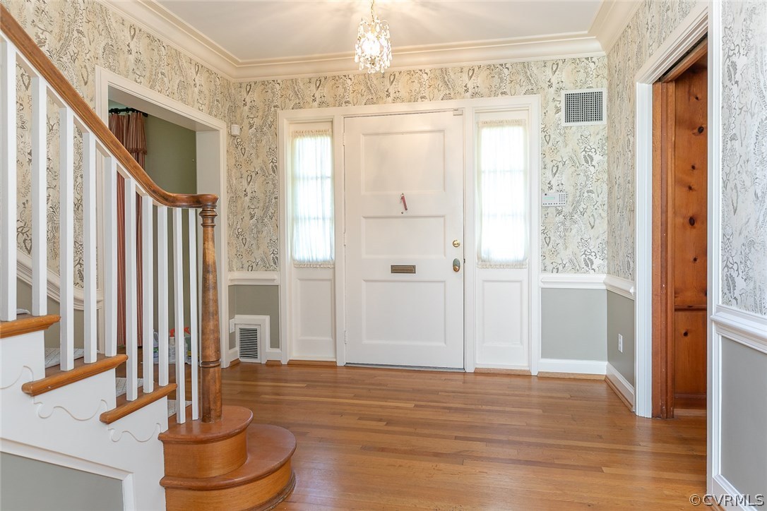 4610 Sulgrave Road Richmond, VA 23221 - Photo 5 of 32 The front door is flanked by two glass pane sideli