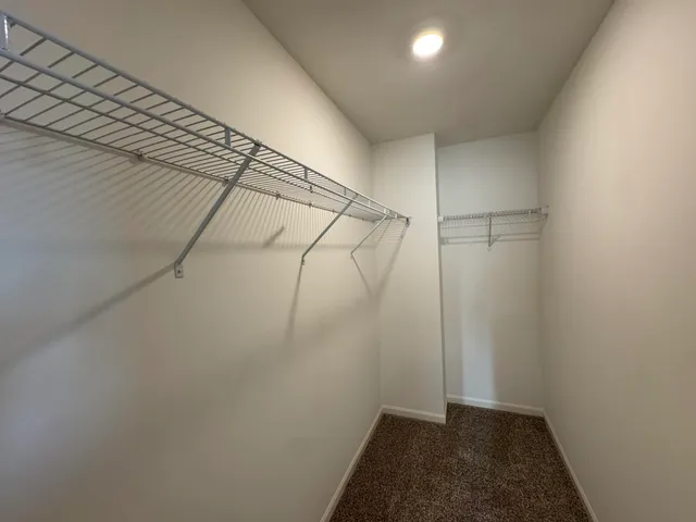 a view of a room with racks on the wall