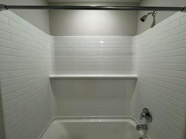 a bathroom with a bathtub