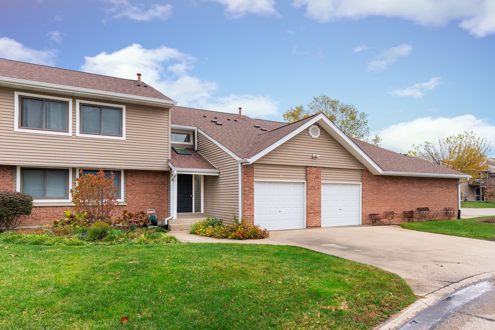 112 Morningside Lane West Buffalo Grove, IL 60089 - Photo 1 of 35 a front view of house with yard and green space