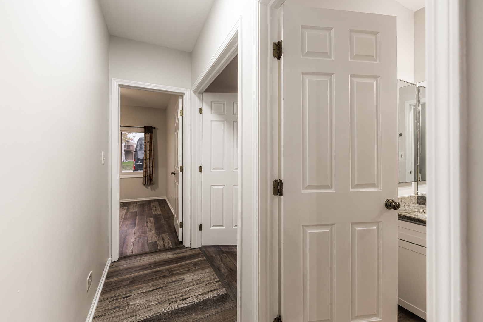 112 Morningside Lane West Buffalo Grove, IL 60089 - Photo 15 of 35 a view of a hallway with wooden floor and closet area