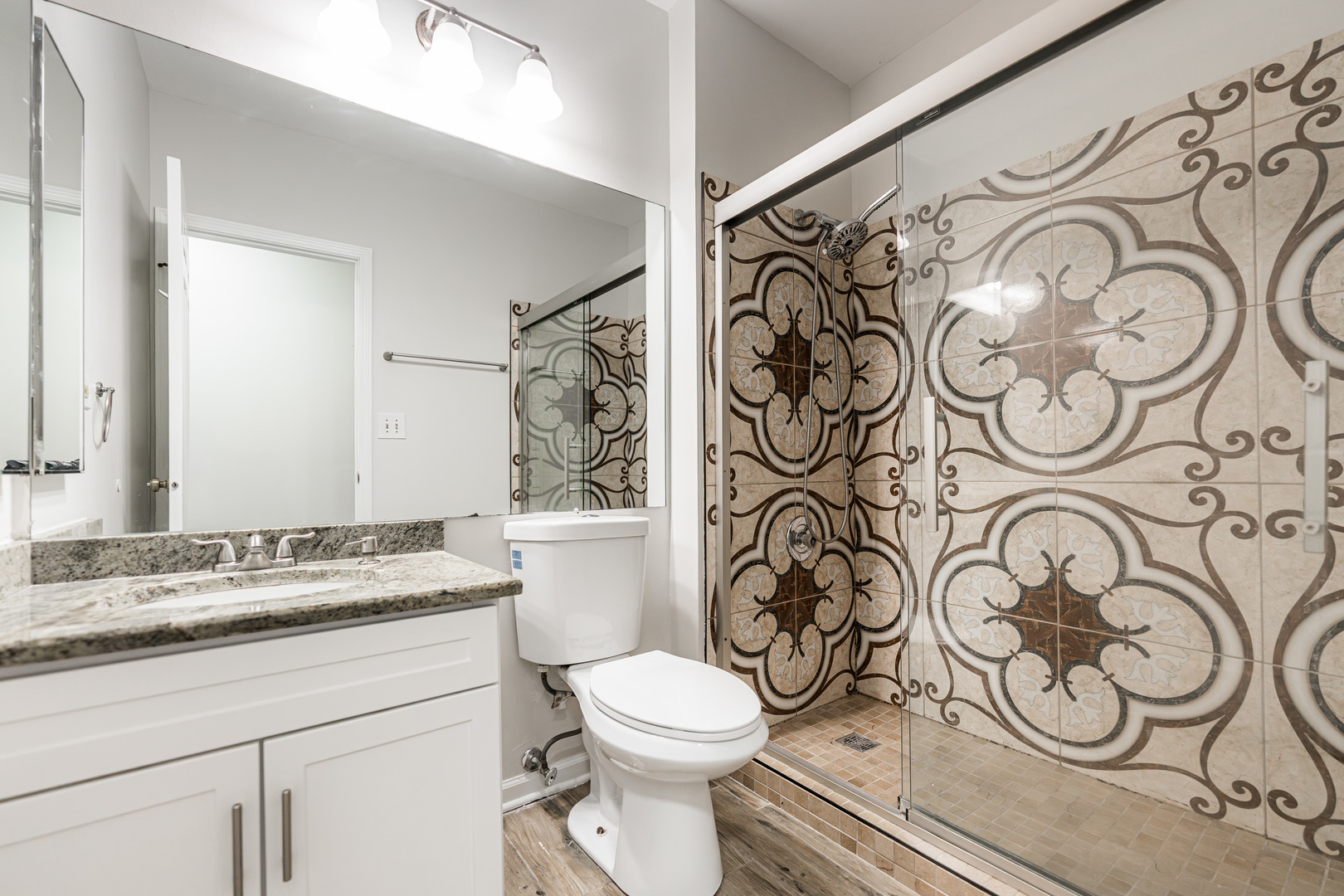 112 Morningside Lane West Buffalo Grove, IL 60089 - Photo 23 of 35 a bathroom with a toilet sink shower and mirror