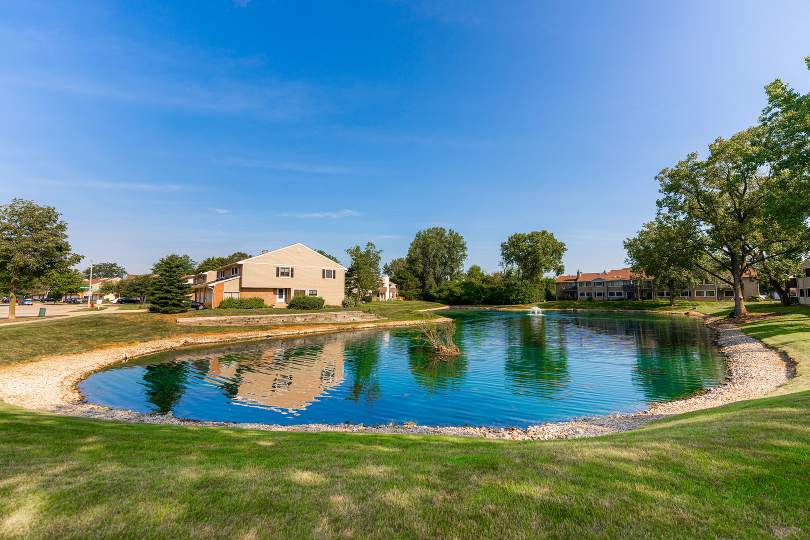 112 Morningside Lane West Buffalo Grove, IL 60089 - Photo 31 of 35 a view of a lake with houses with outdoor space