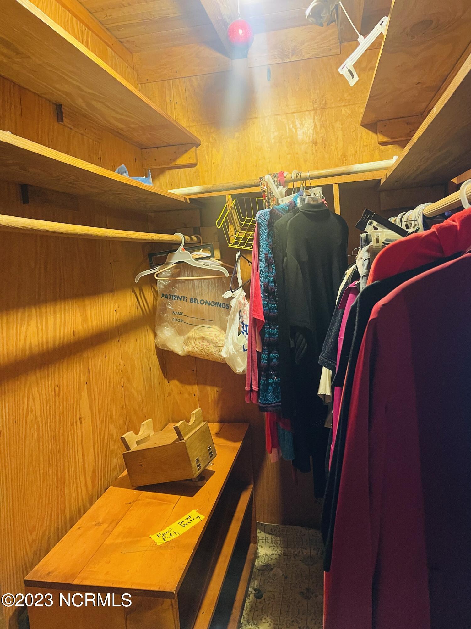 6185 Rough And Ready Road Chadbourn, NC 28431 - Photo 64 of 78 Spacious walk in master closet area in the log cabins master suite.