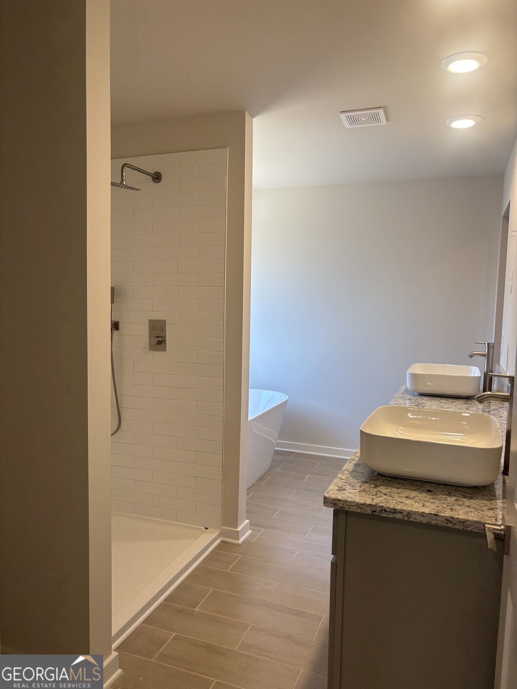 5349 Tolar Road South Fulton, GA 30213 - Photo 26 of 36 a bathroom with a sink toilet and shower