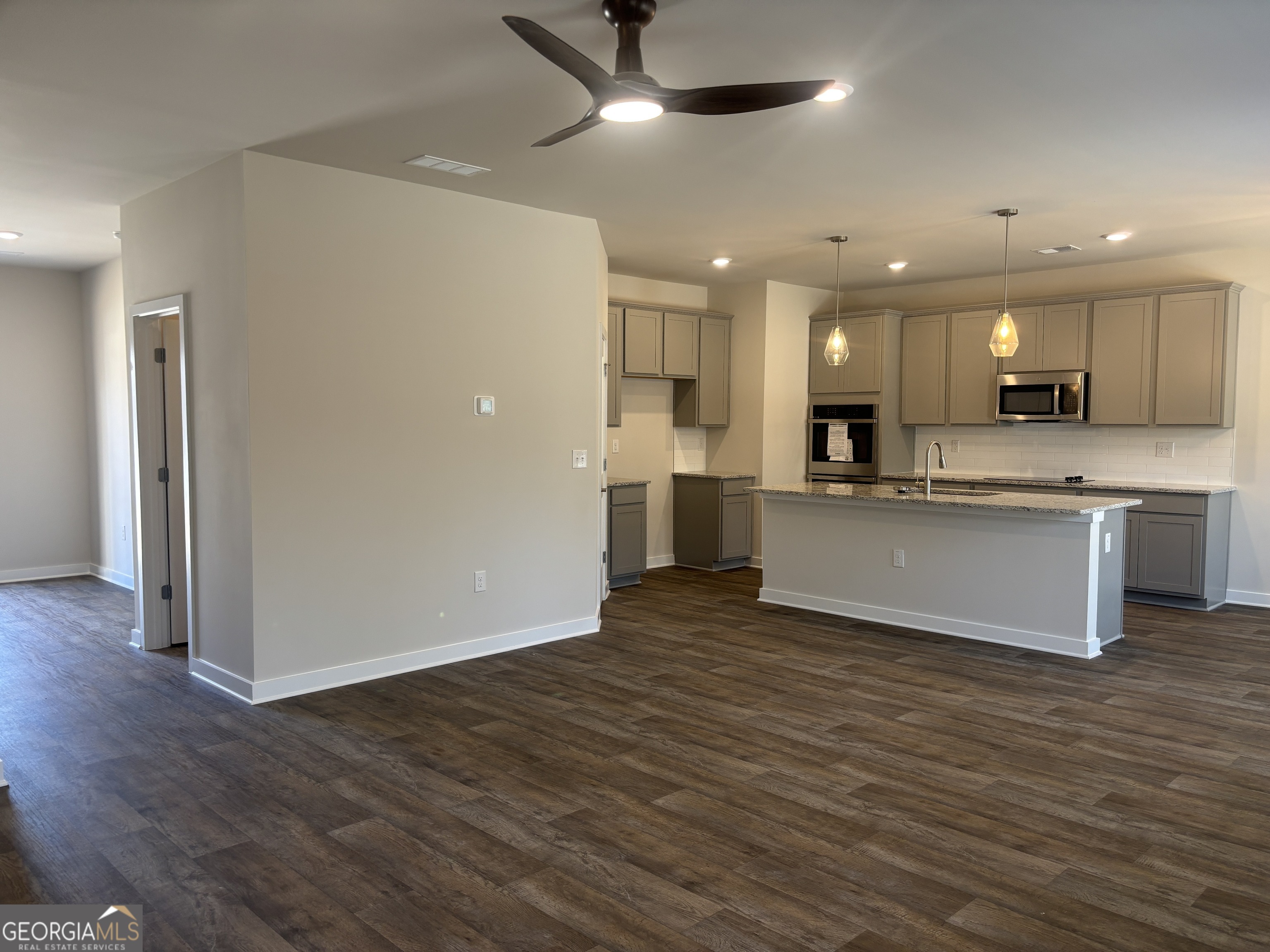5349 Tolar Road South Fulton, GA 30213 - Photo 3 of 36 a view of kitchen with wooden floor and window