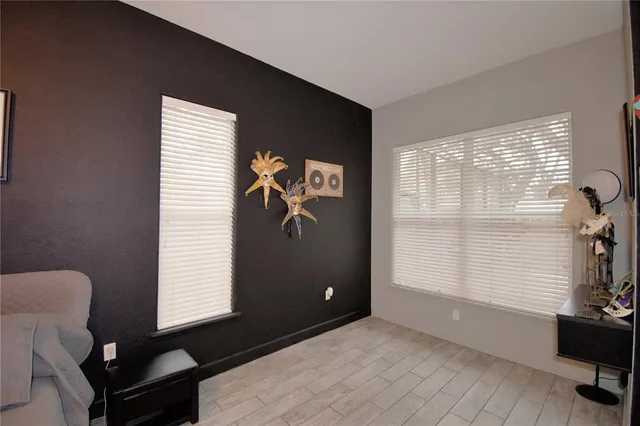 a spacious bathroom with a double vanity sink and a mirror