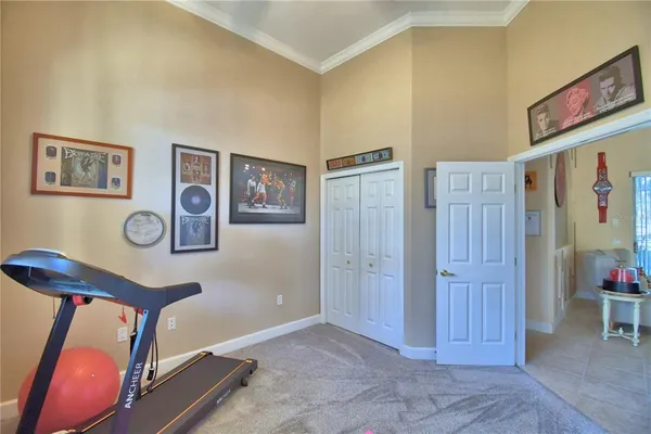 a view of a swimming pool with an outdoor seating