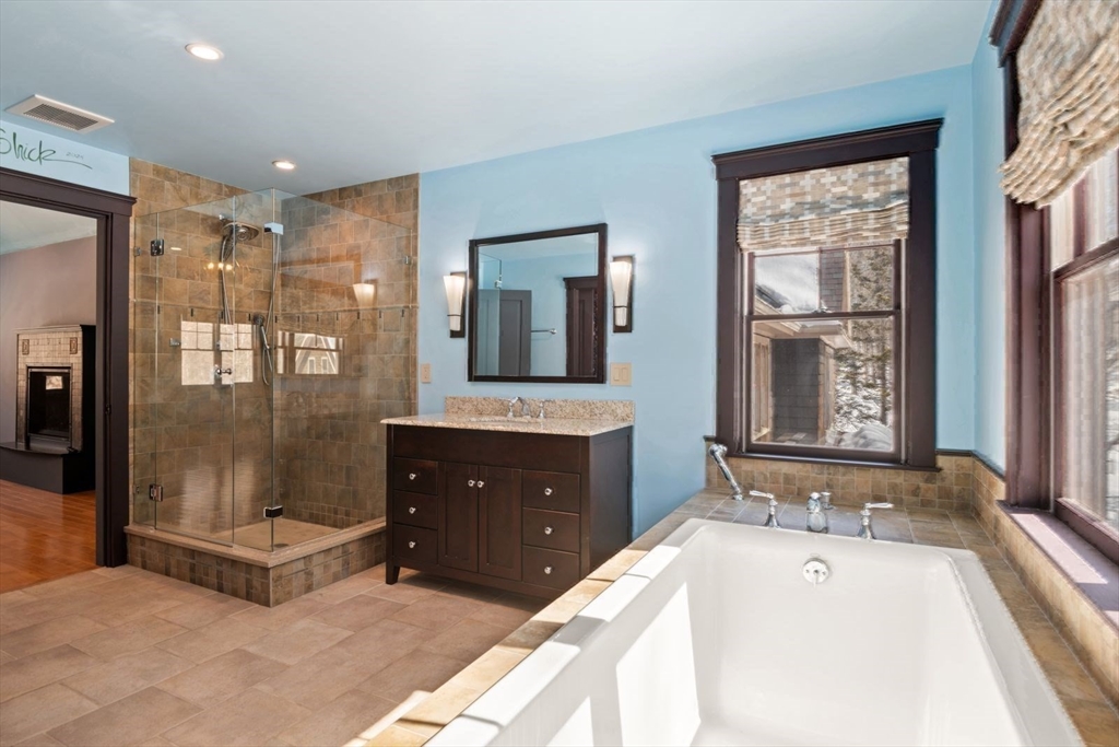 2 Spingler Way Hamilton, MA 01982 - Photo 28 of 40 a spacious bathroom with a tub sink and mirror