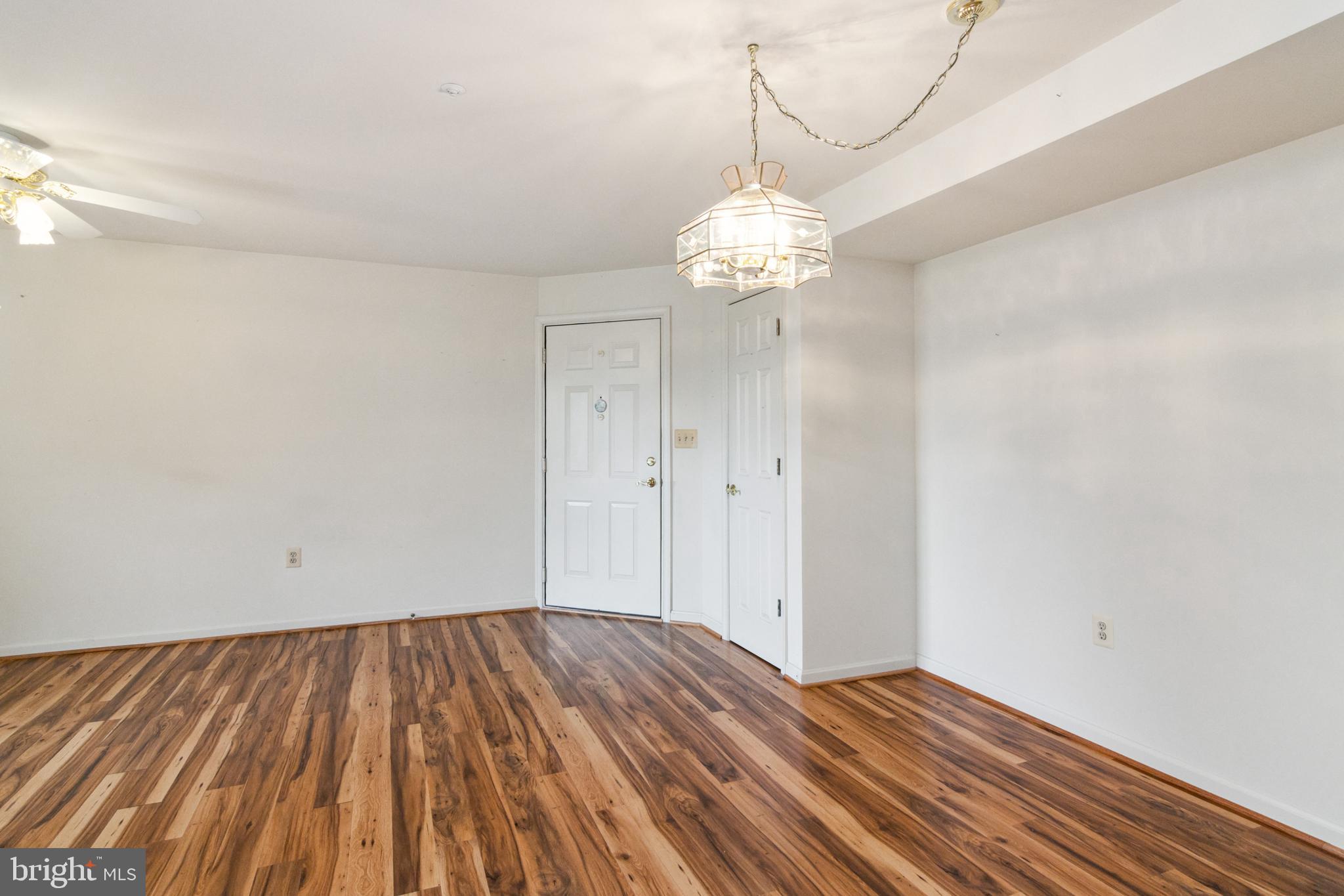 3830 Normandy Drive, Unit 2B Hampstead, MD 21074 - Photo 3 of 25 Open to living room and dining room