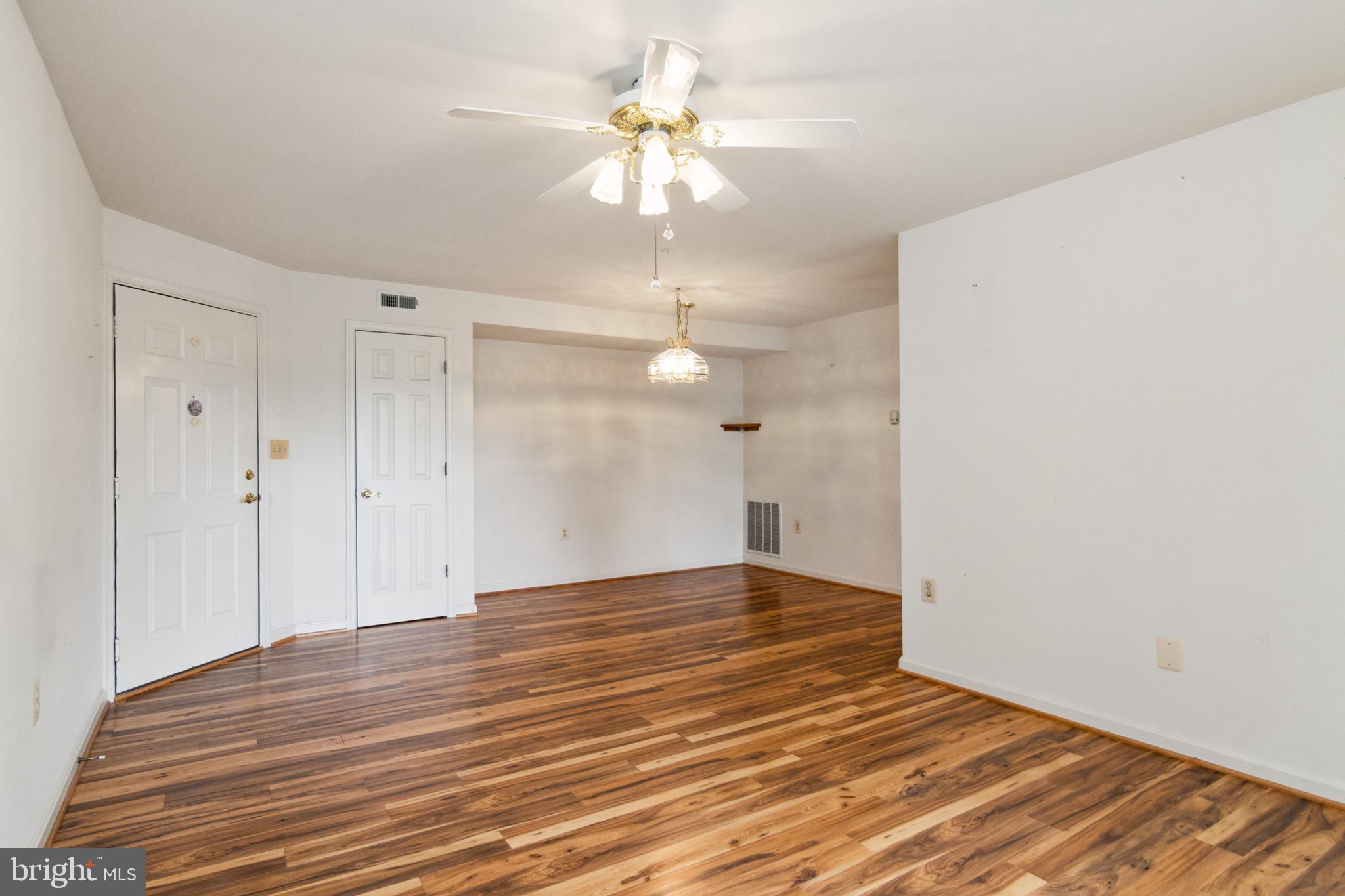 3830 Normandy Drive, Unit 2B Hampstead, MD 21074 - Photo 4 of 25 Beautiful flooring throughout