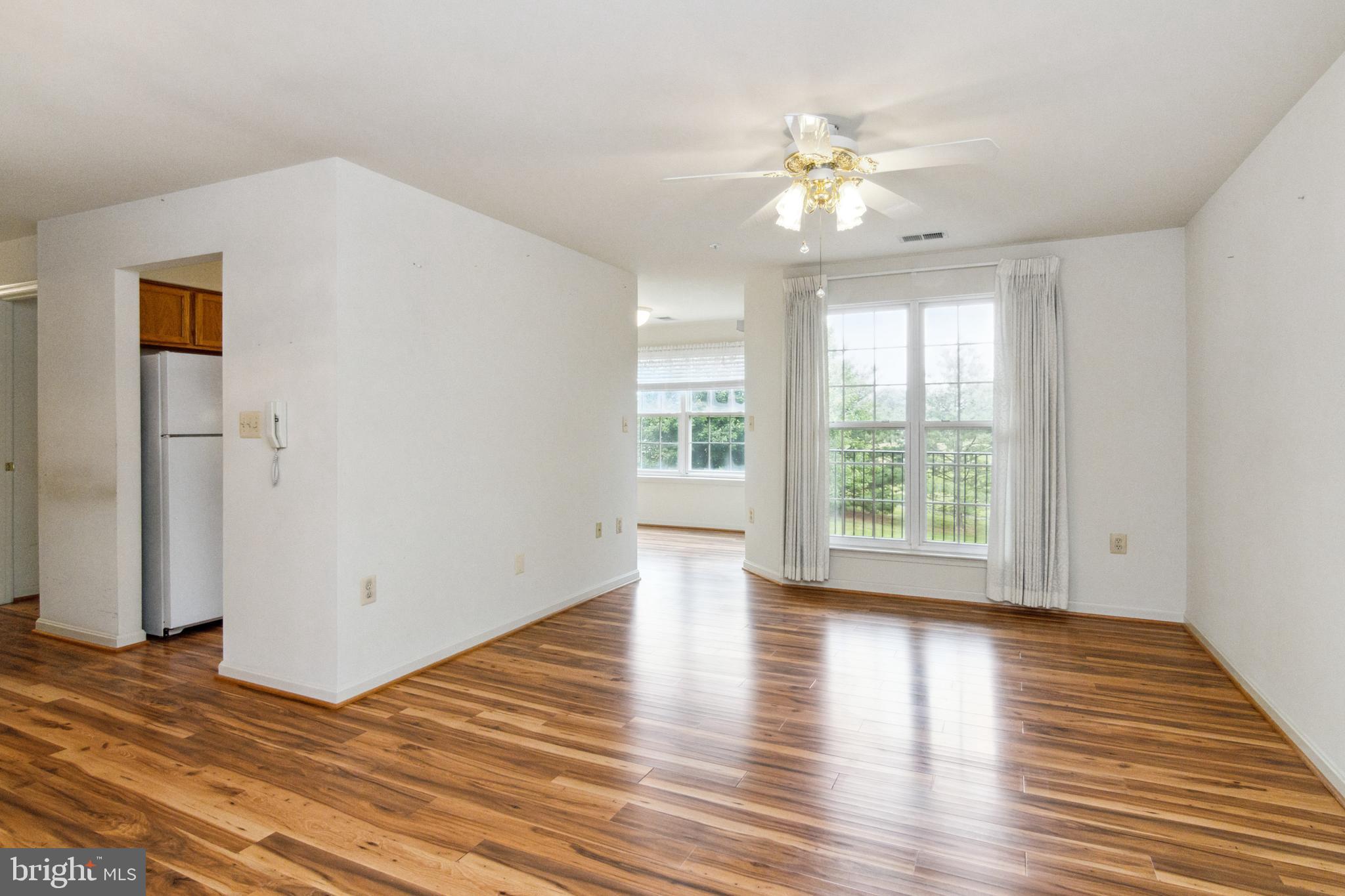 3830 Normandy Drive, Unit 2B Hampstead, MD 21074 - Photo 5 of 25 Bright, airy living room