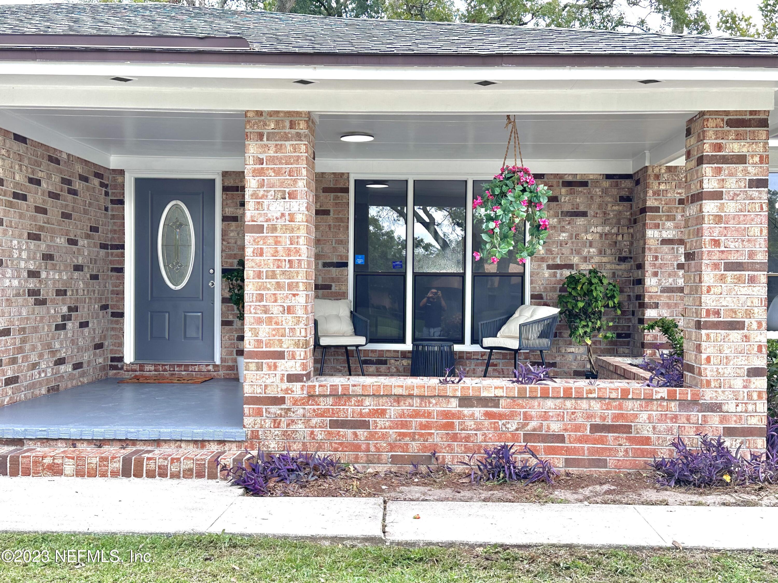 6175 Briar Forest Road West Jacksonville, FL 32277 - Photo 4 of 36 a view of a entryway door of the house