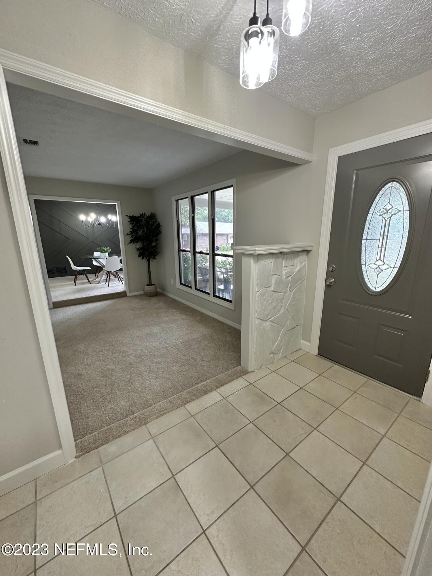 6175 Briar Forest Road West Jacksonville, FL 32277 - Photo 6 of 36 a view of a hallway with entryway
