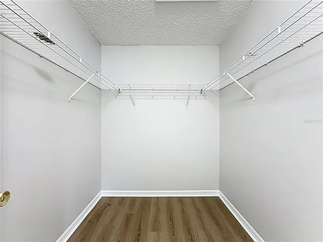 a view of a room with racks on the wall