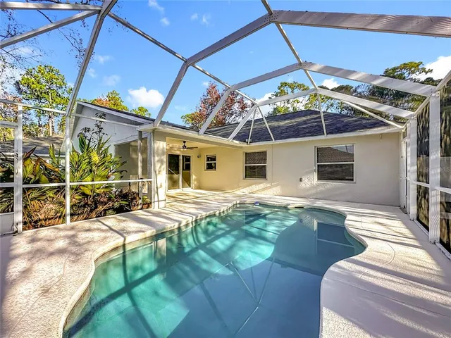 a front view of a house with swimming pool