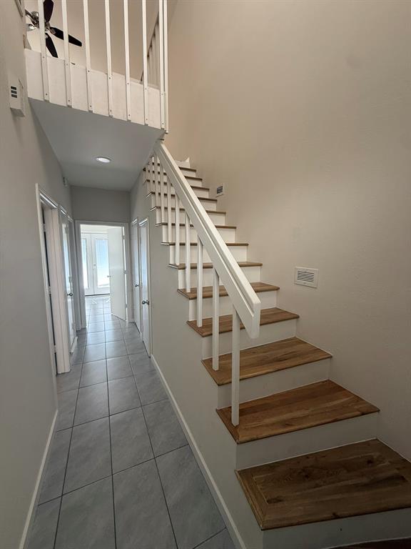 4231 Gilbert Avenue Dallas, TX 75219 - Photo 14 of 14 a view of entryway and hall with wooden floor